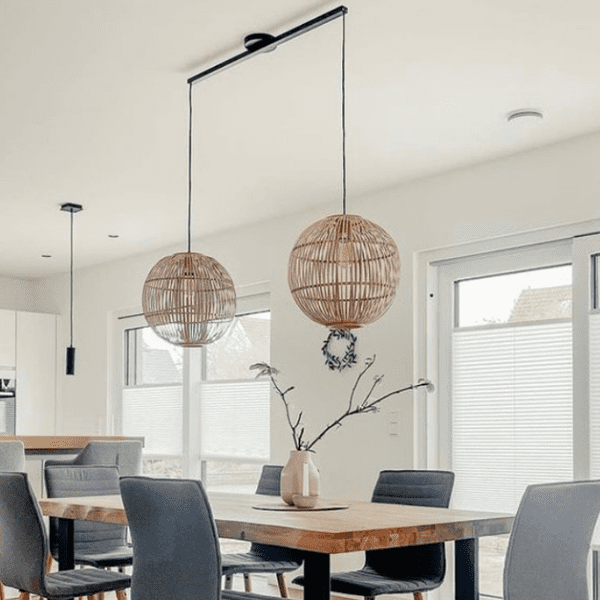 How high should a pendant light hang above the dining table