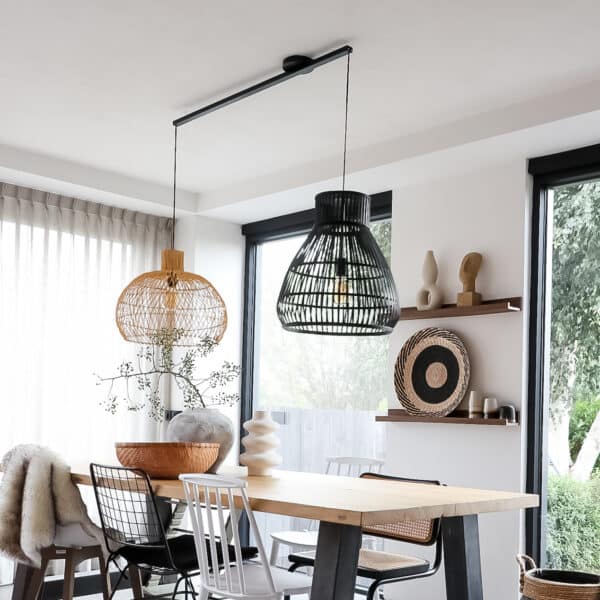 stylish Lightswing® Twin matte black at the dining table