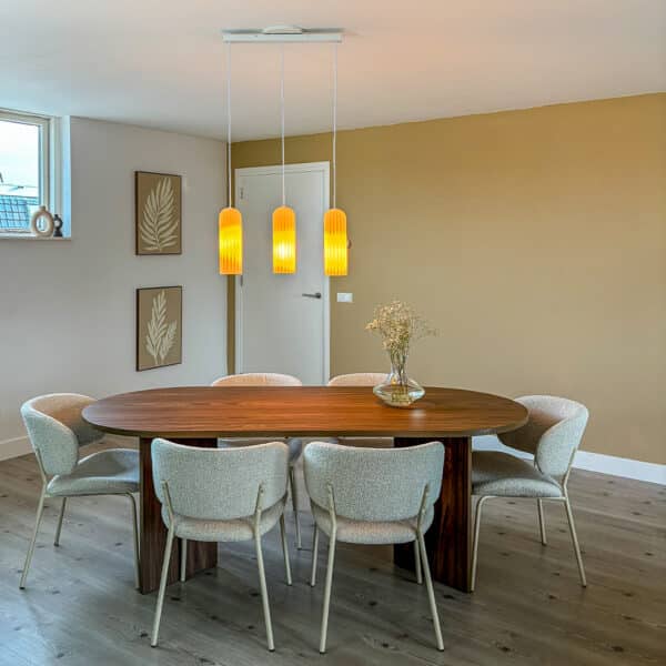 Lightswing® Zero White with three pendant lights above dining table in modern dining room