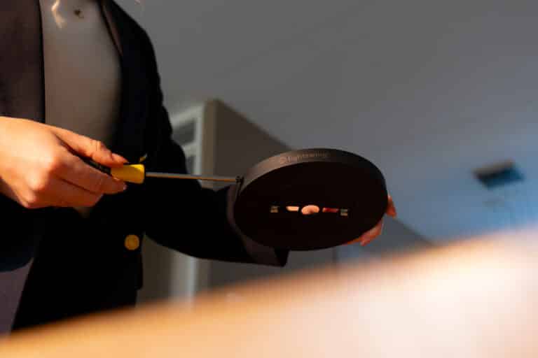 Lightswing® Zero mounting plate being assembled with screwdriver