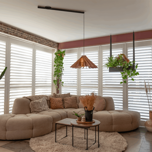 Lightswing® Single Matt black with Pendant Light Novo Naturel above coffee table in modern living room